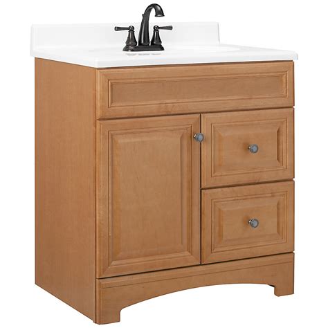 This Glacier Bay 30.5 in. W Fallsburg vanity in Halifax oak is a freestanding bathroom vanity with a full-extension drawer, matte black pulls, and a white vanity top. This modern vanity features a full-overlay design with flat-panel door and drawer profiles. Its 2-door cabinet and full-extension wrap-around drawer provide complete access to your …